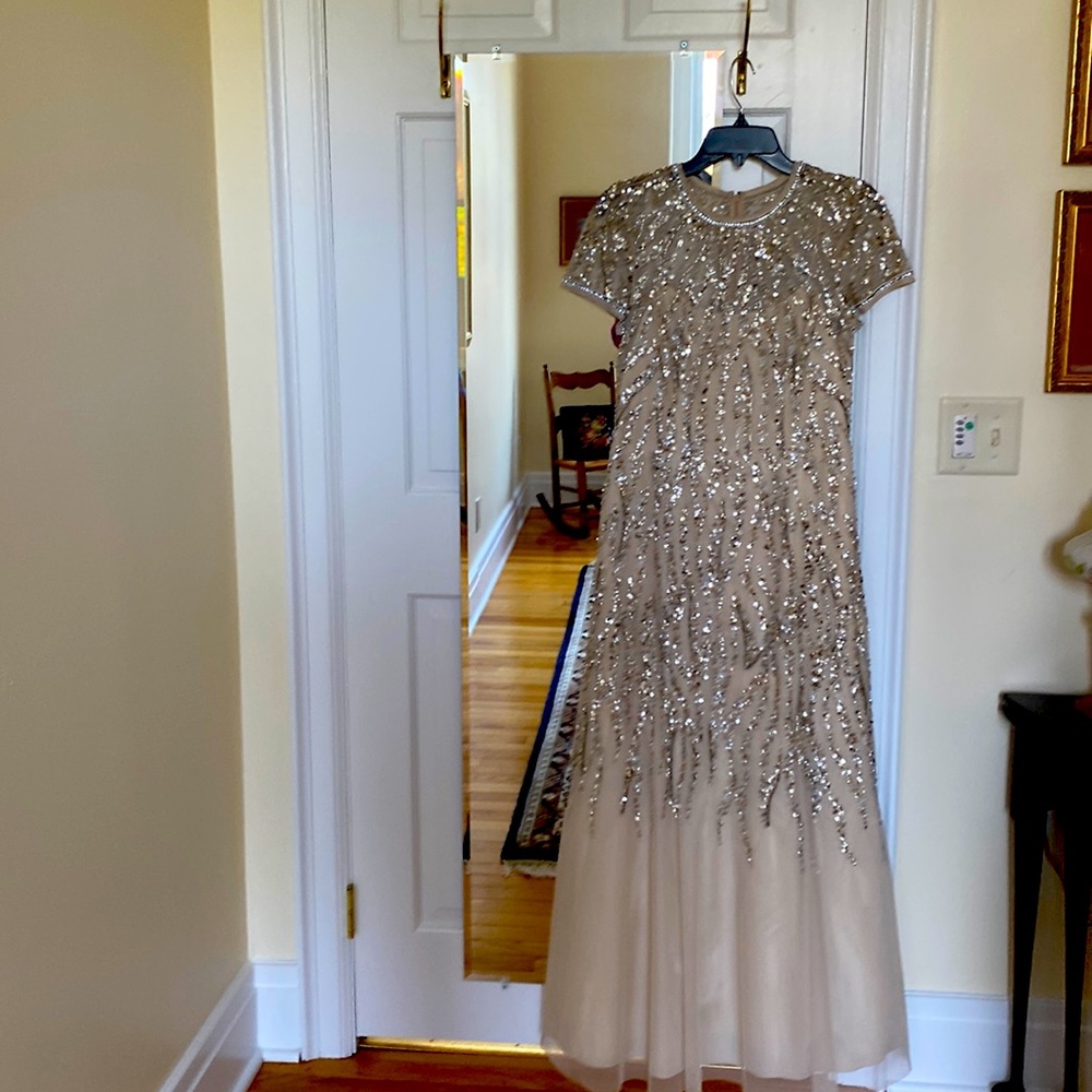 Beautiful gown, worn once. Natural waistline. Excellent condition
